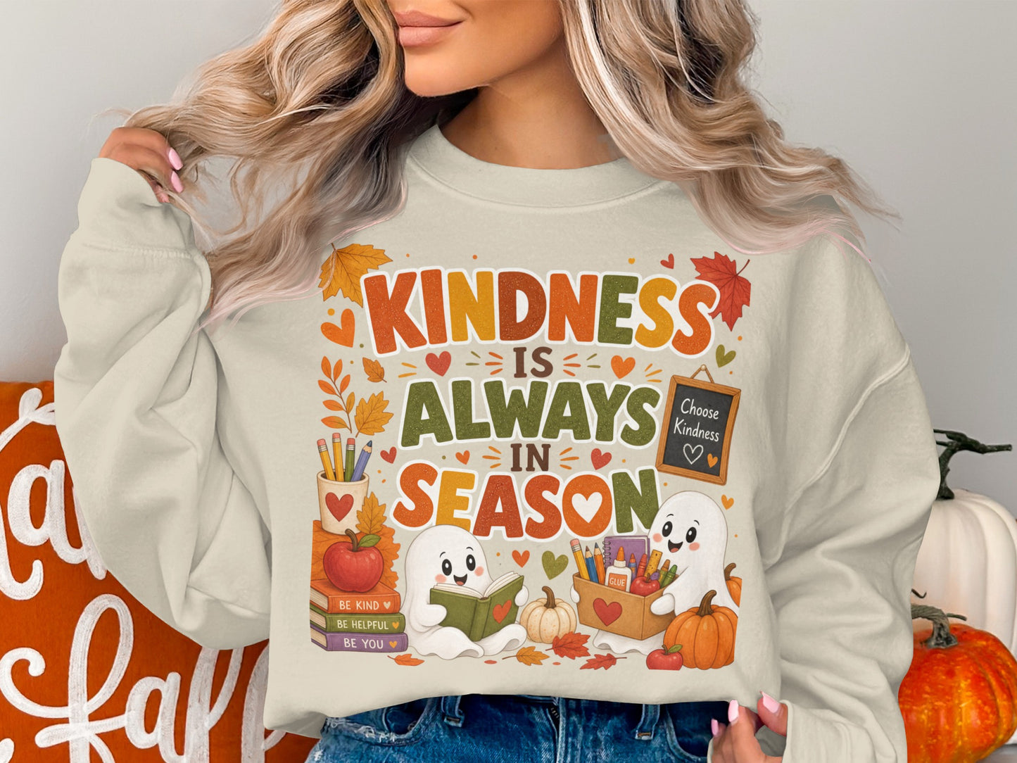 Crewneck sweatshirt with "Kindness is Always in Season" text and cute ghosts reading.