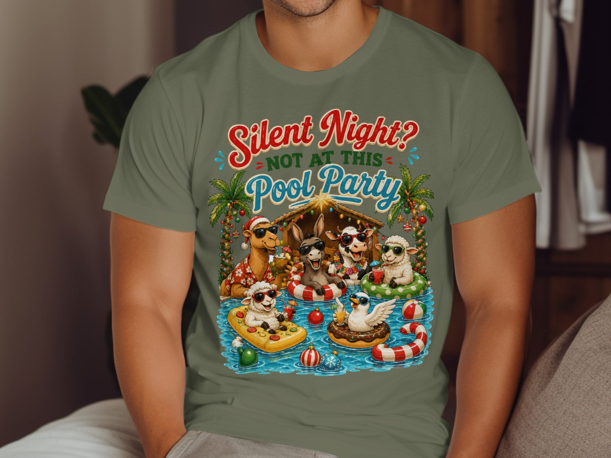 Christmas nativity scene animals in pool with text "Silent Night? Not at this Pool Party".