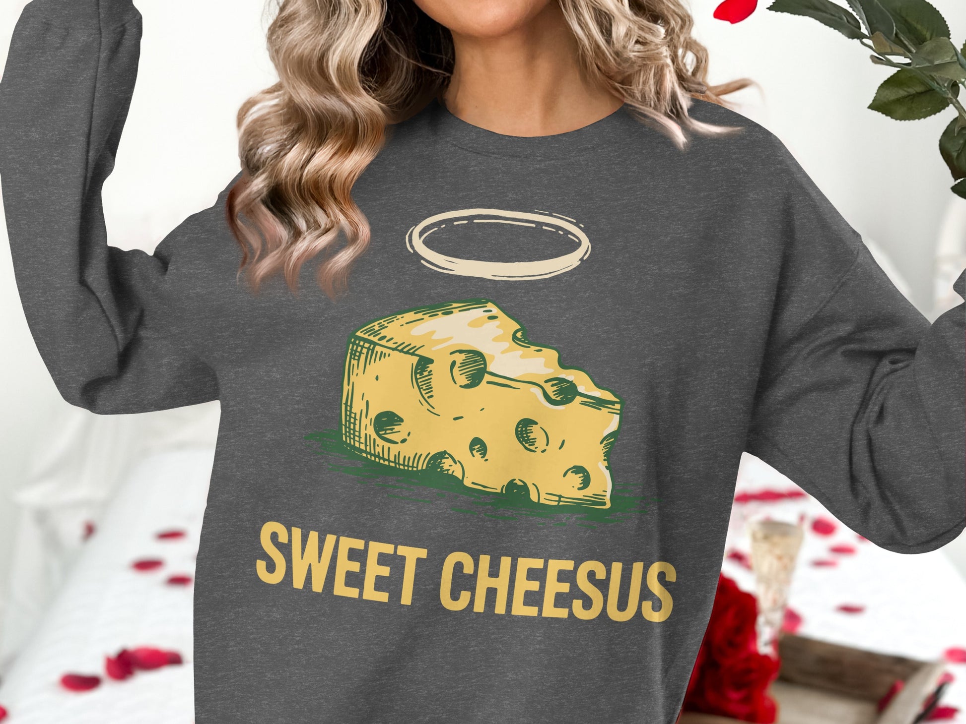 Grey sweatshirt with "Sweet Cheesus" and a drawing of cheese with a halo.
