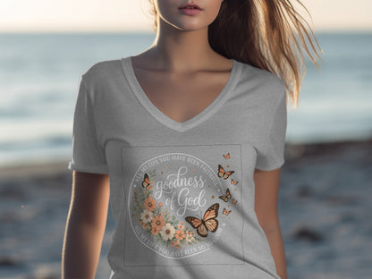 Gray V-neck t-shirt with floral wreath and "Goodness of God" text.