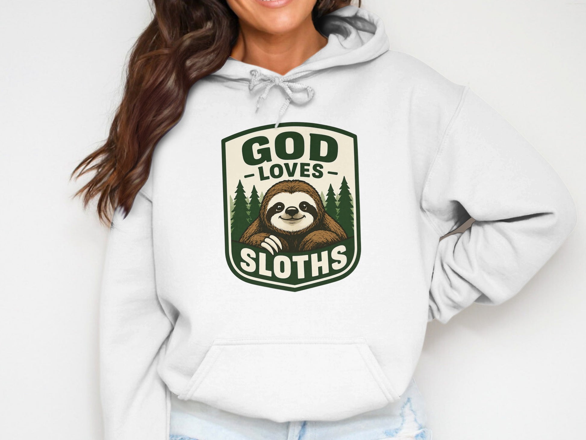 White hoodie featuring a logo with a sloth and text "GOD LOVES SLOTHS".