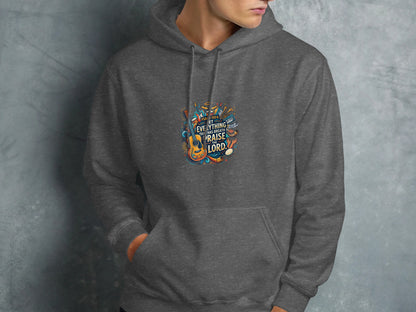 Gray hoodie with circular colorful graphic featuring musical instruments and "Praise the Lord."