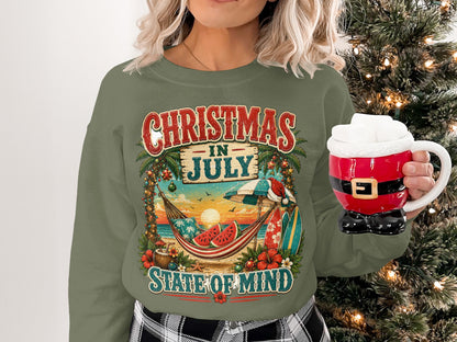 Christmas in July graphic sweatshirt with tropical beach scene.