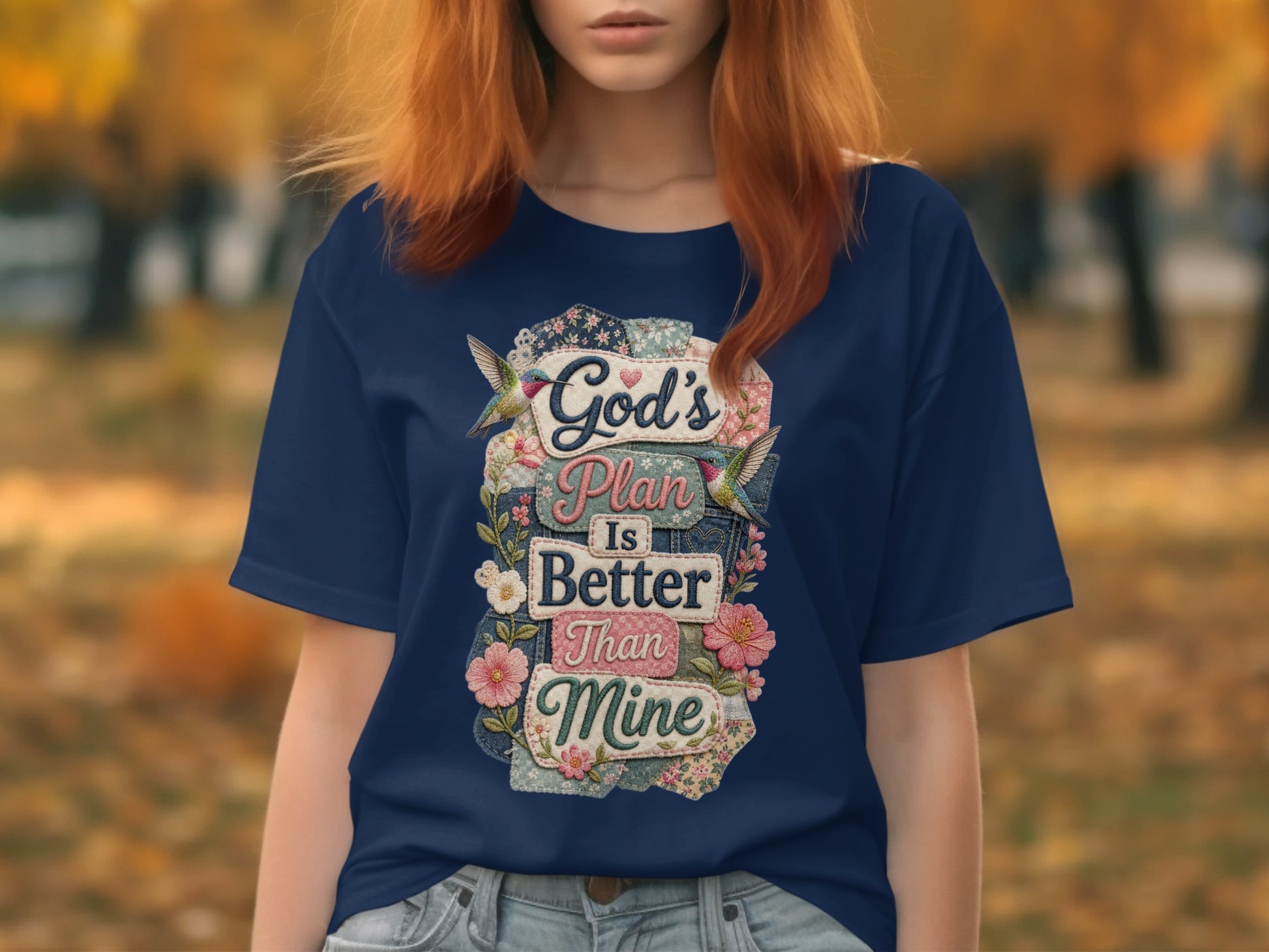 Navy t-shirt with "God's Plan Is Better Than Mine" text and floral accents.