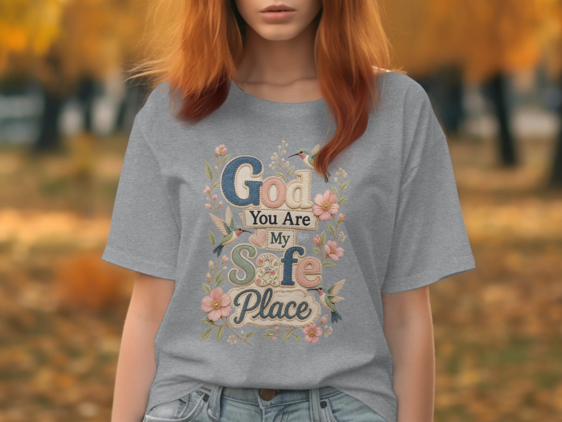 Gray t-shirt with "God You are My Safe Place" text and floral hummingbird design.