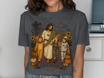 Jesus walks with children in costumes on a path, promoting courage, faith, and love.