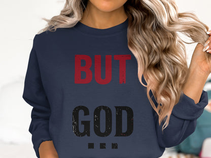 Navy sweatshirt with "BUT GOD" in distressed red and black text.