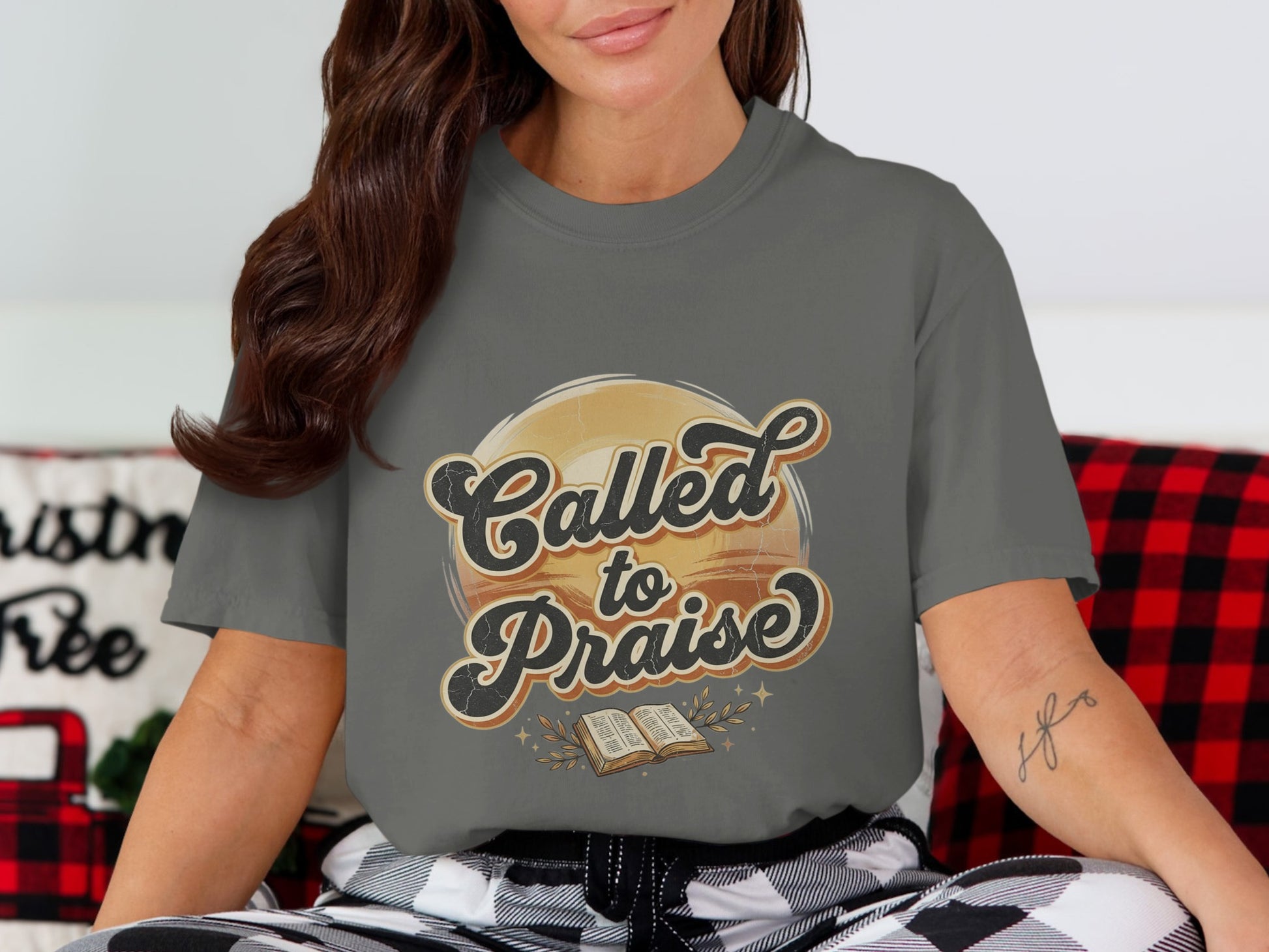 Gray t-shirt with "Called to Praise" text above an open book.