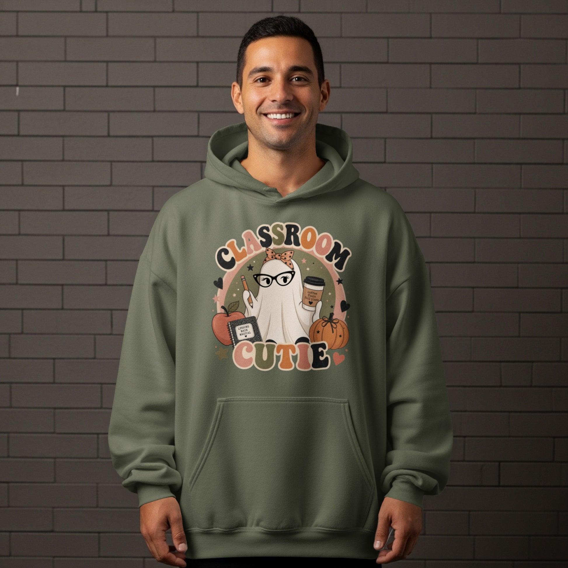 Ghost graphic with "Classroom Cutie" text, holding coffee and a pencil, with apple and pumpkin accents.