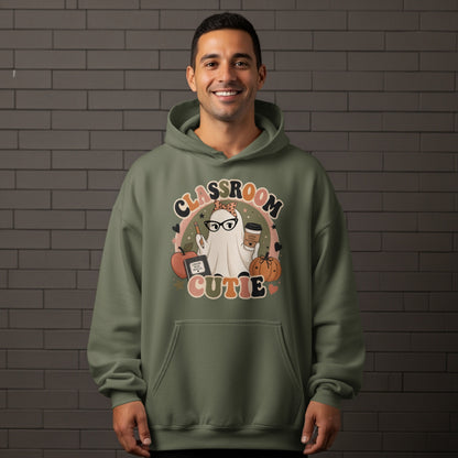 Ghost graphic with "Classroom Cutie" text, holding coffee and a pencil, with apple and pumpkin accents.