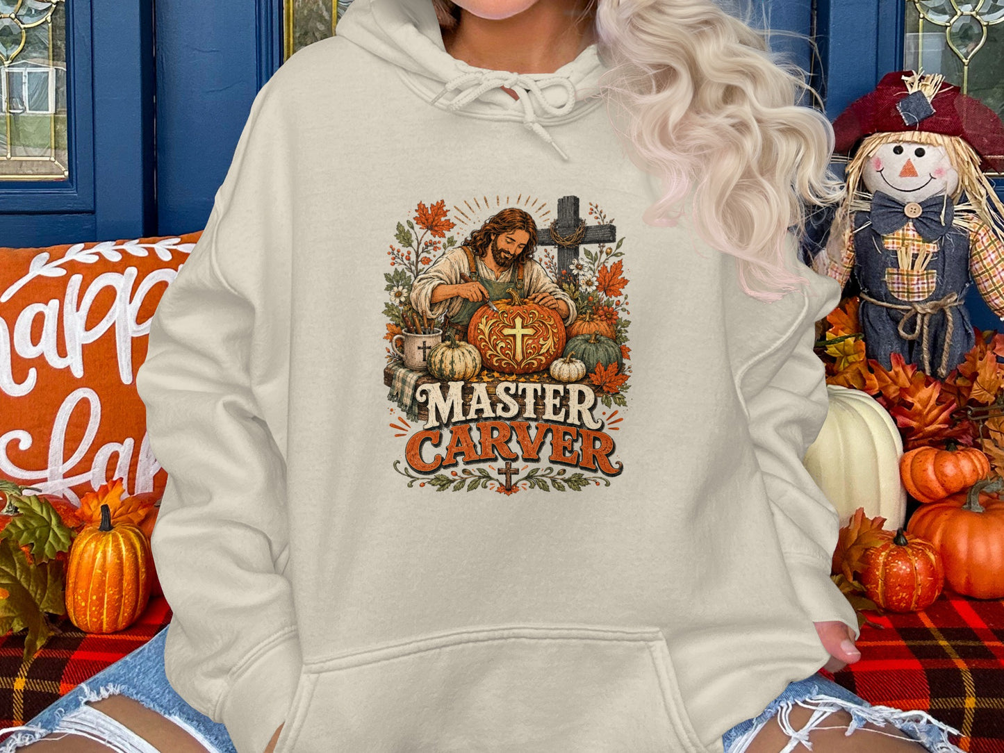 Hoodie graphic with fall leaves, pumpkins, and "Master Carver" text.