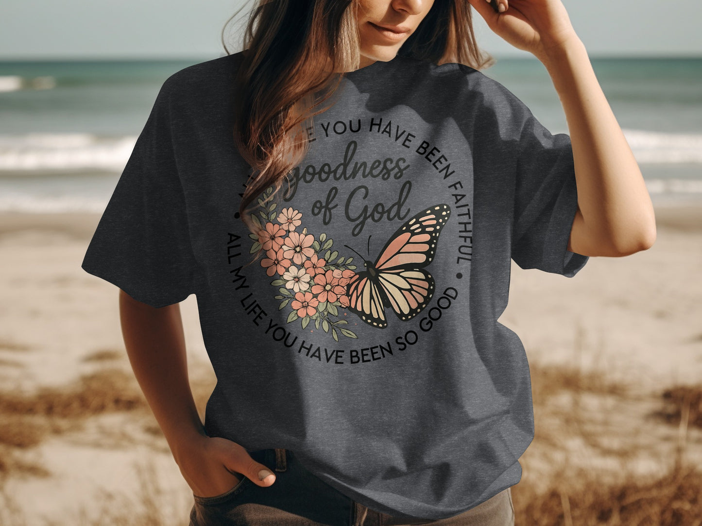 Dark gray t-shirt with "Goodness of God" and butterfly design.