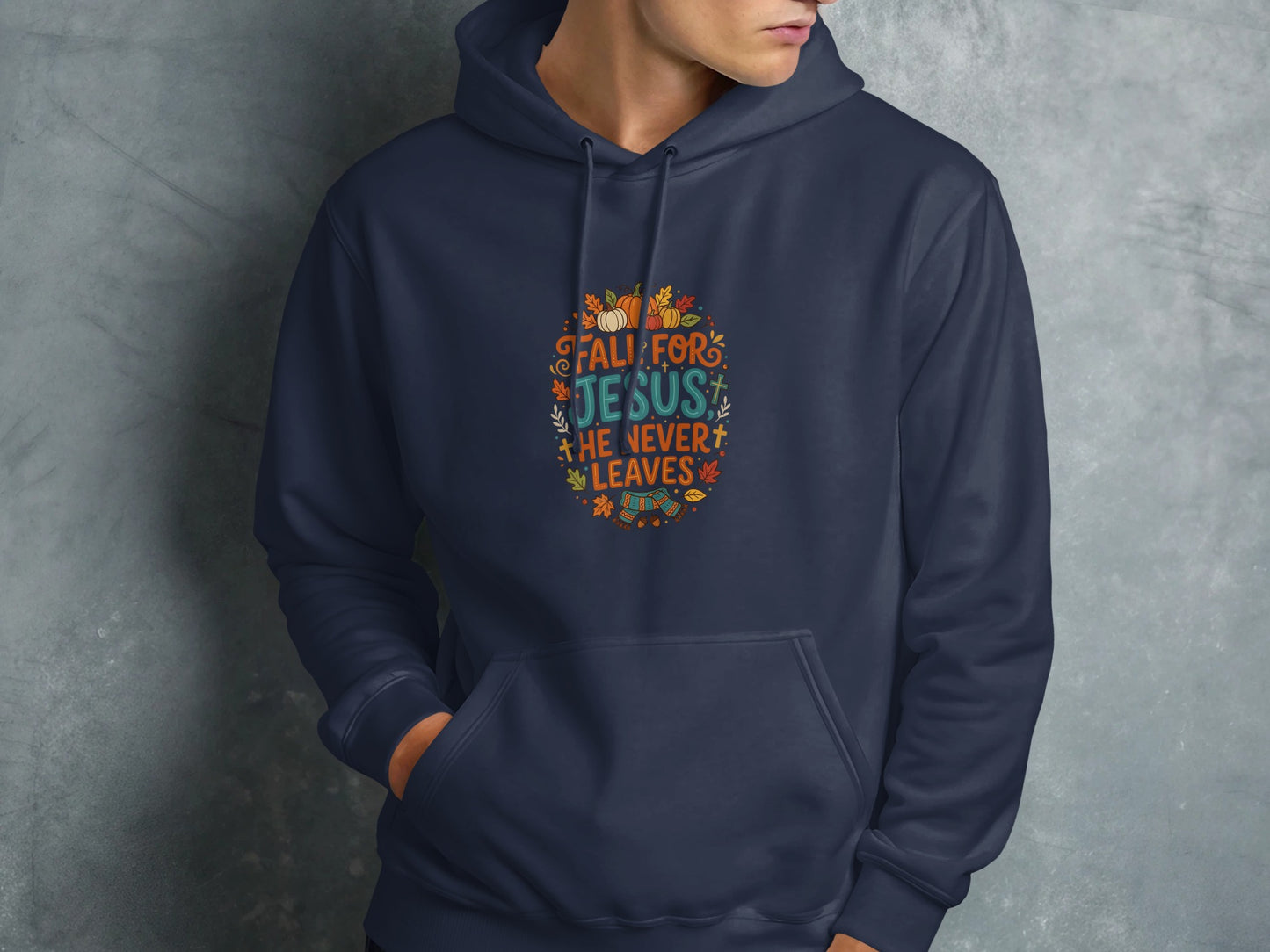 Navy blue hoodie with "Fall For Jesus" text and autumn illustrations.
