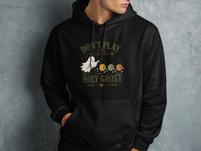 Black hoodie with "Don't Play with the Holy Ghost" and ghost characters.