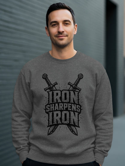 Man wearing a gray sweatshirt with crossed swords and "Iron Sharpens Iron" text.