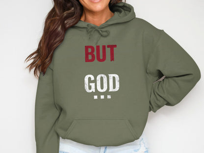 Green hoodie with white and red text that reads "BUT GOD".