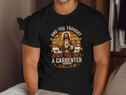 Jesus holding a pumpkin with "Jesus was only a carpenter" text.