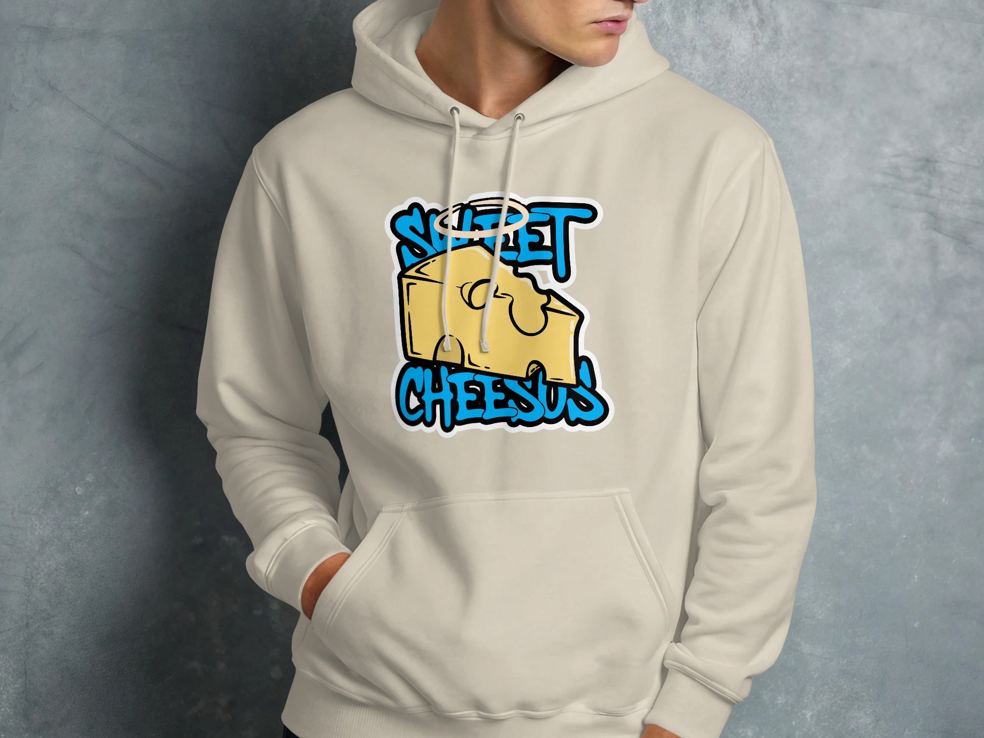 Cream hoodie with "Sweet Cheesus" text and a cartoon cheese slice graphic.