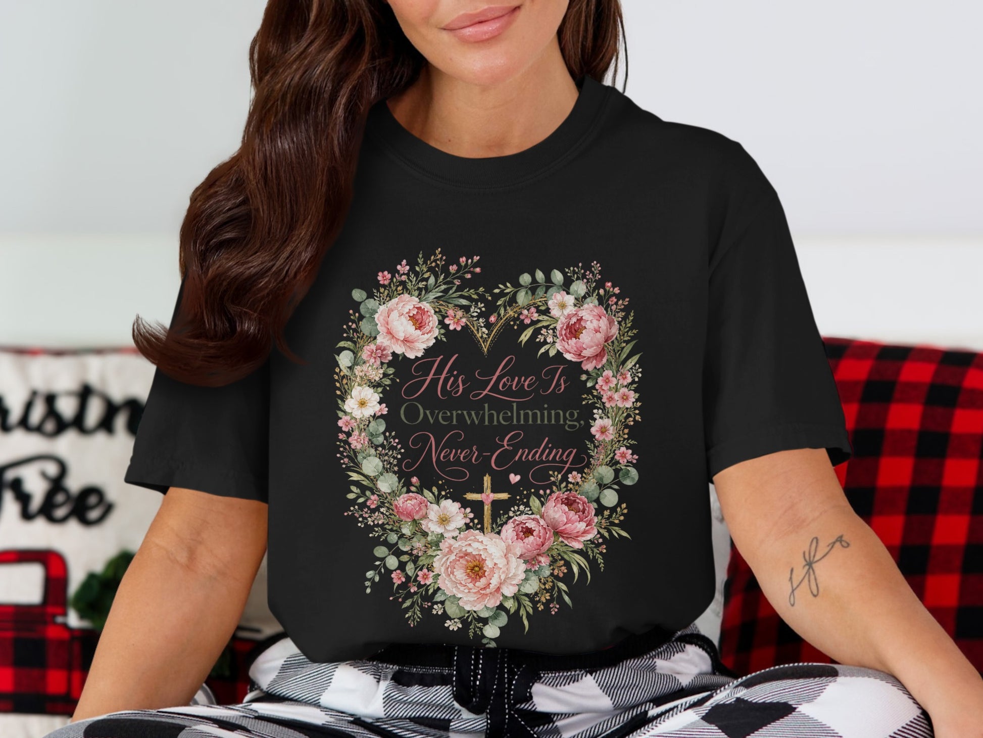Black t-shirt with floral heart graphic and text "His Love Is Overwhelming, Never-Ending".