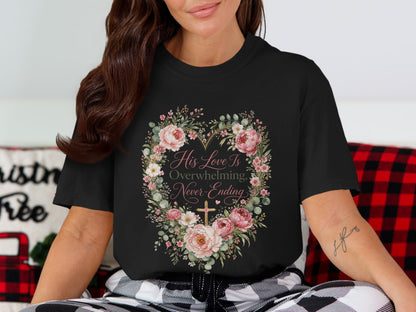 Black t-shirt with floral heart graphic and text "His Love Is Overwhelming, Never-Ending".