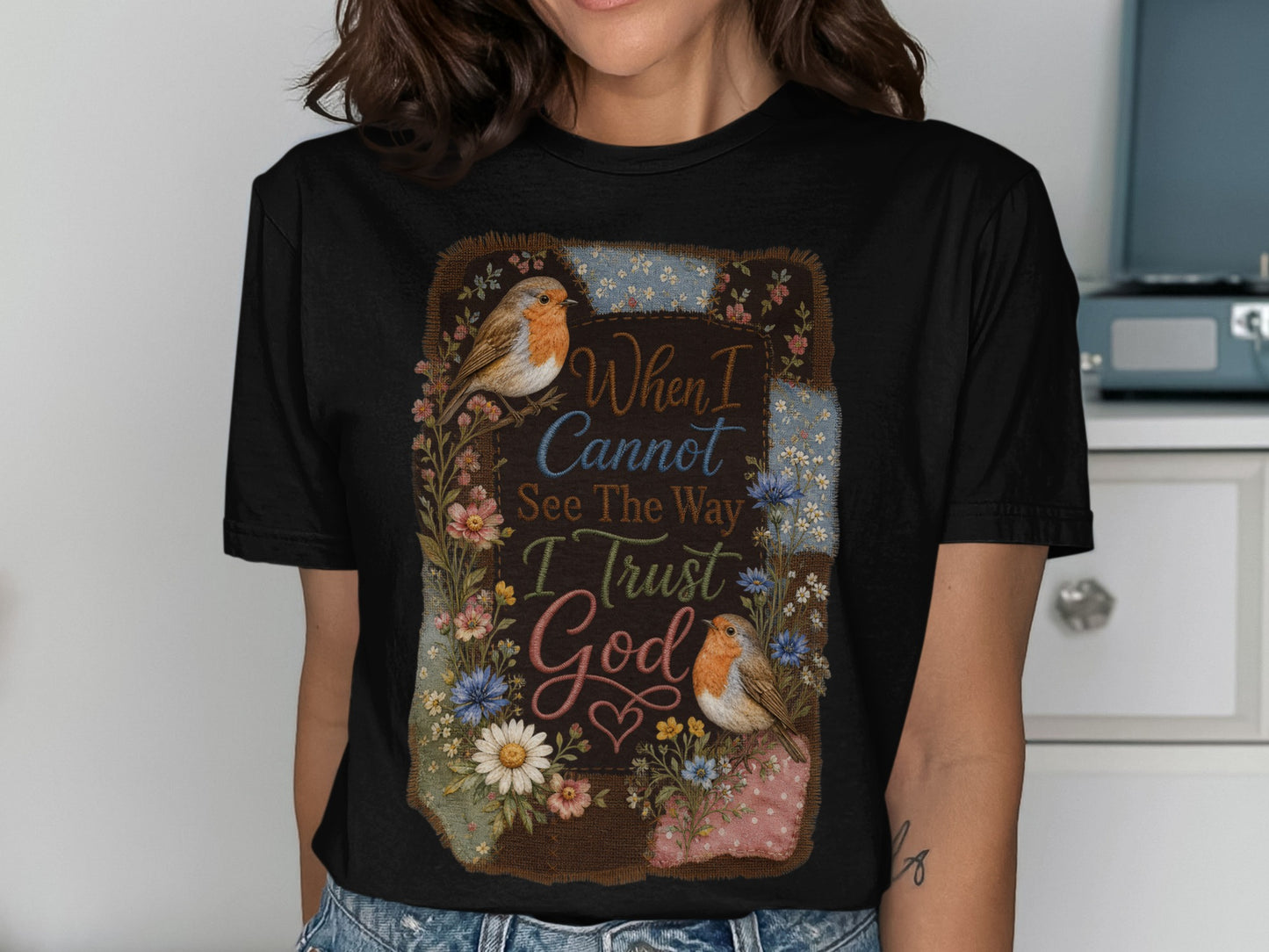 Black t-shirt with "When I Cannot See The Way I Trust God" and two birds.