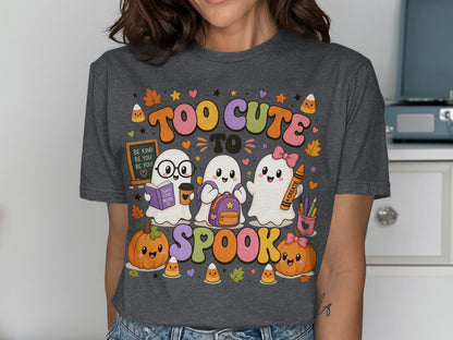 Three ghosts and pumpkins with text "Too Cute to Spook" and "Teach Love Inspire".