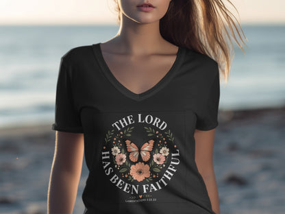 Black V-neck t-shirt with floral circle design, butterflies, and text.