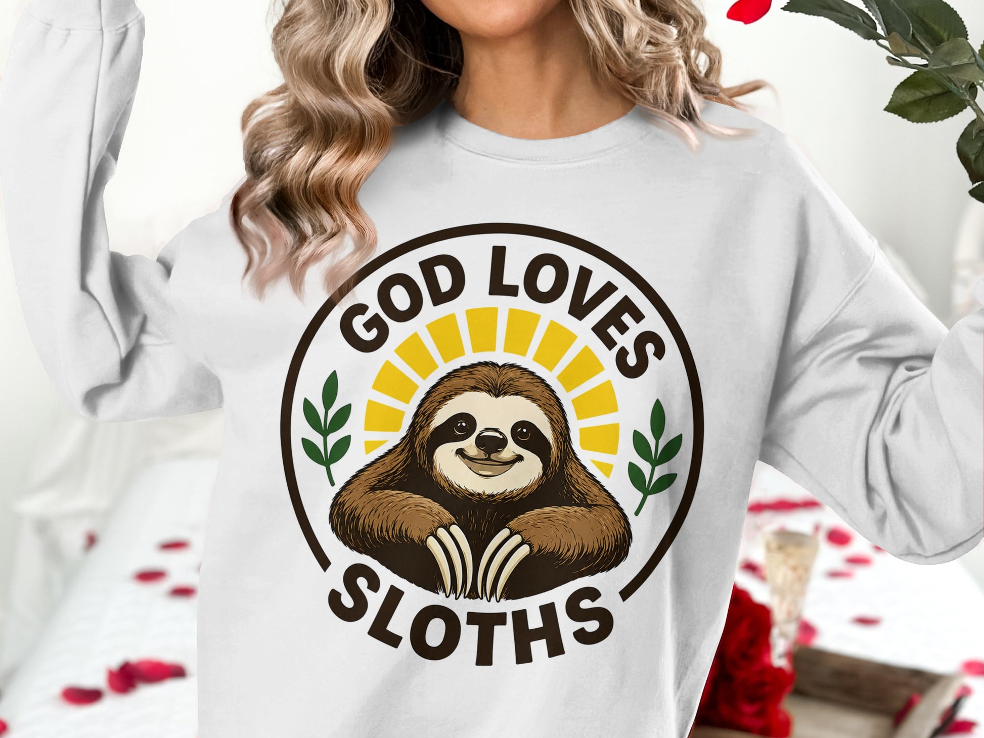Sweatshirt with sloth, sun, and text "God Loves Sloths".