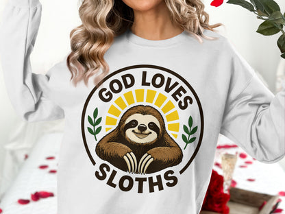 Sweatshirt with sloth, sun, and text "God Loves Sloths".