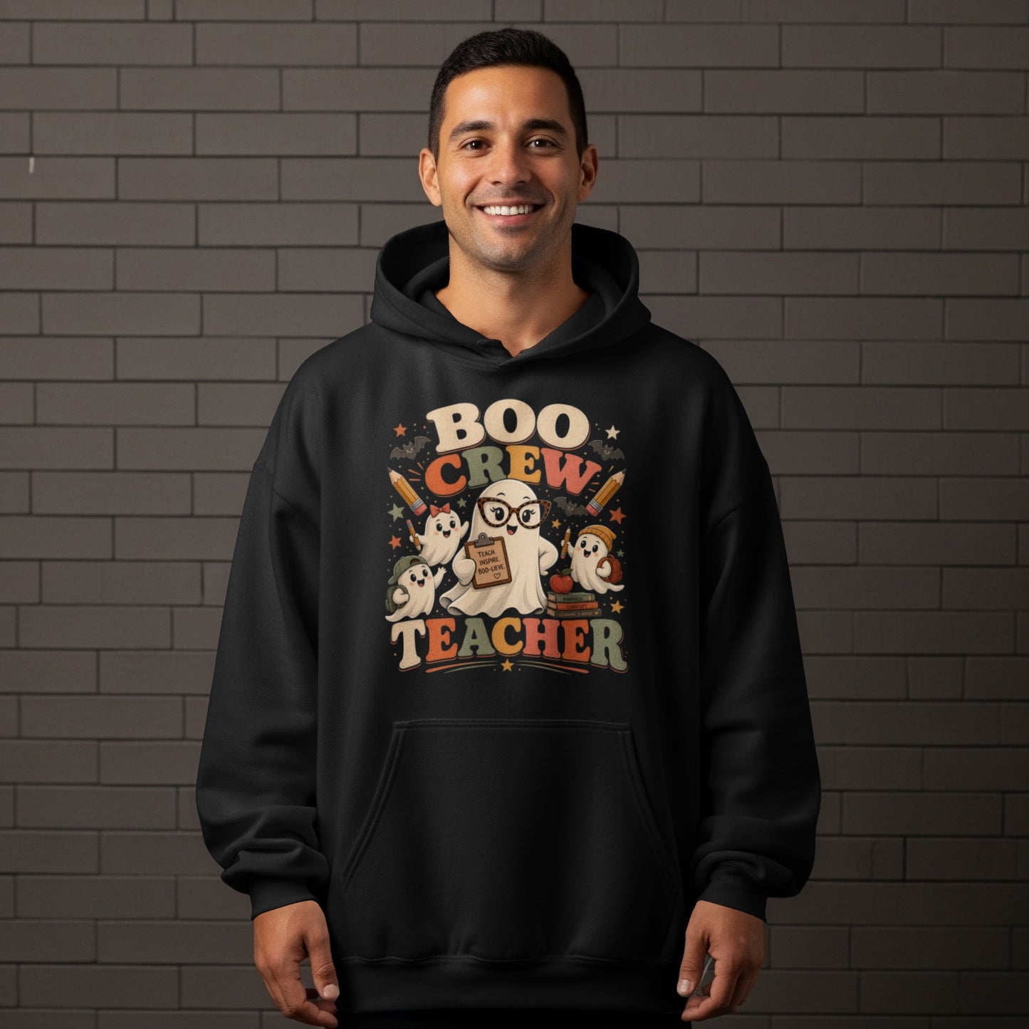 Black hoodie with "Boo Crew Teacher" design featuring ghosts, pencils, and books.