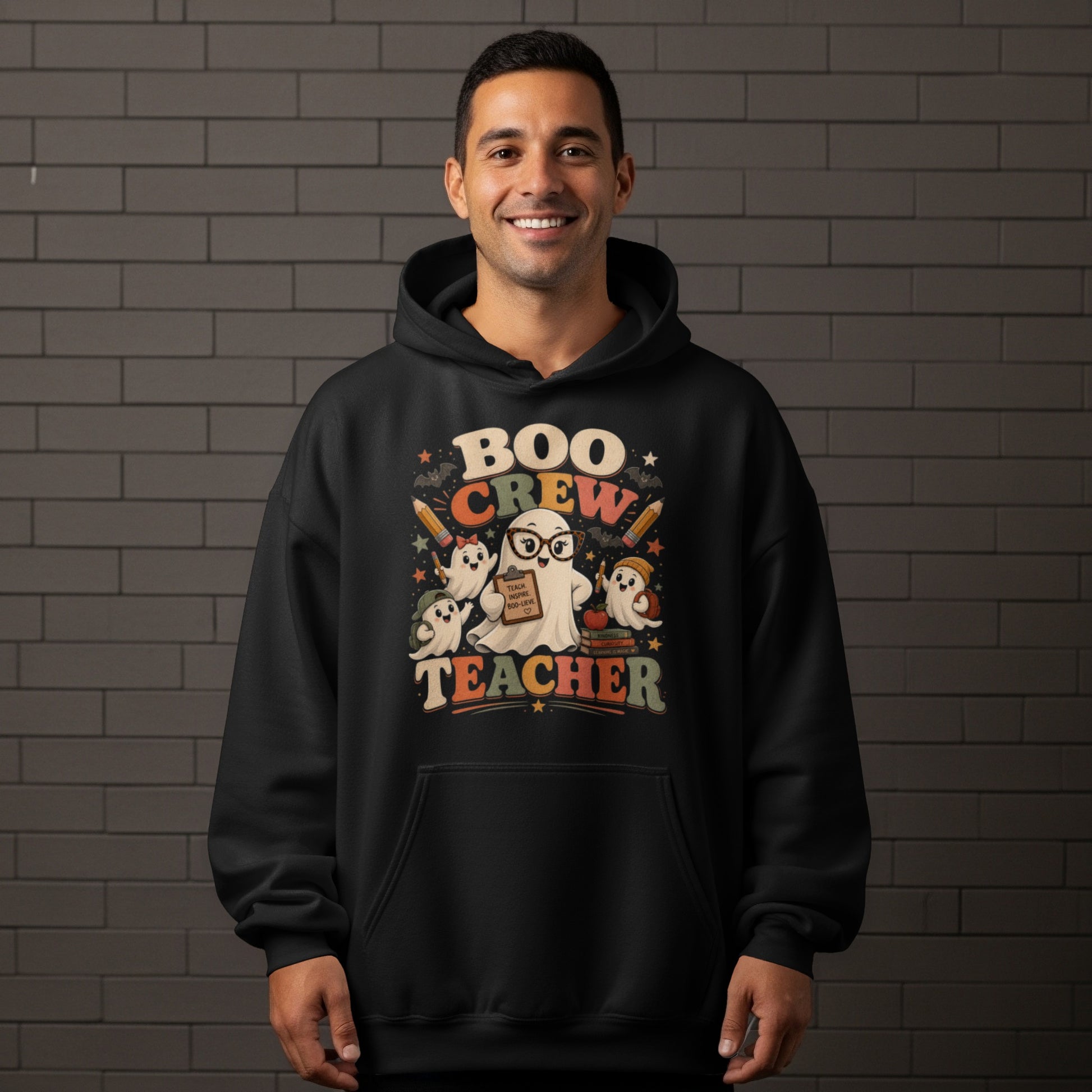 Black hoodie with "Boo Crew Teacher" design featuring ghosts, pencils, and books.