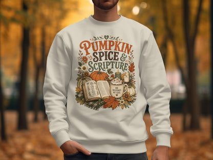 Sweatshirt with "Pumpkin Spice & Scripture" text, open Bible, candle, and pumpkin.