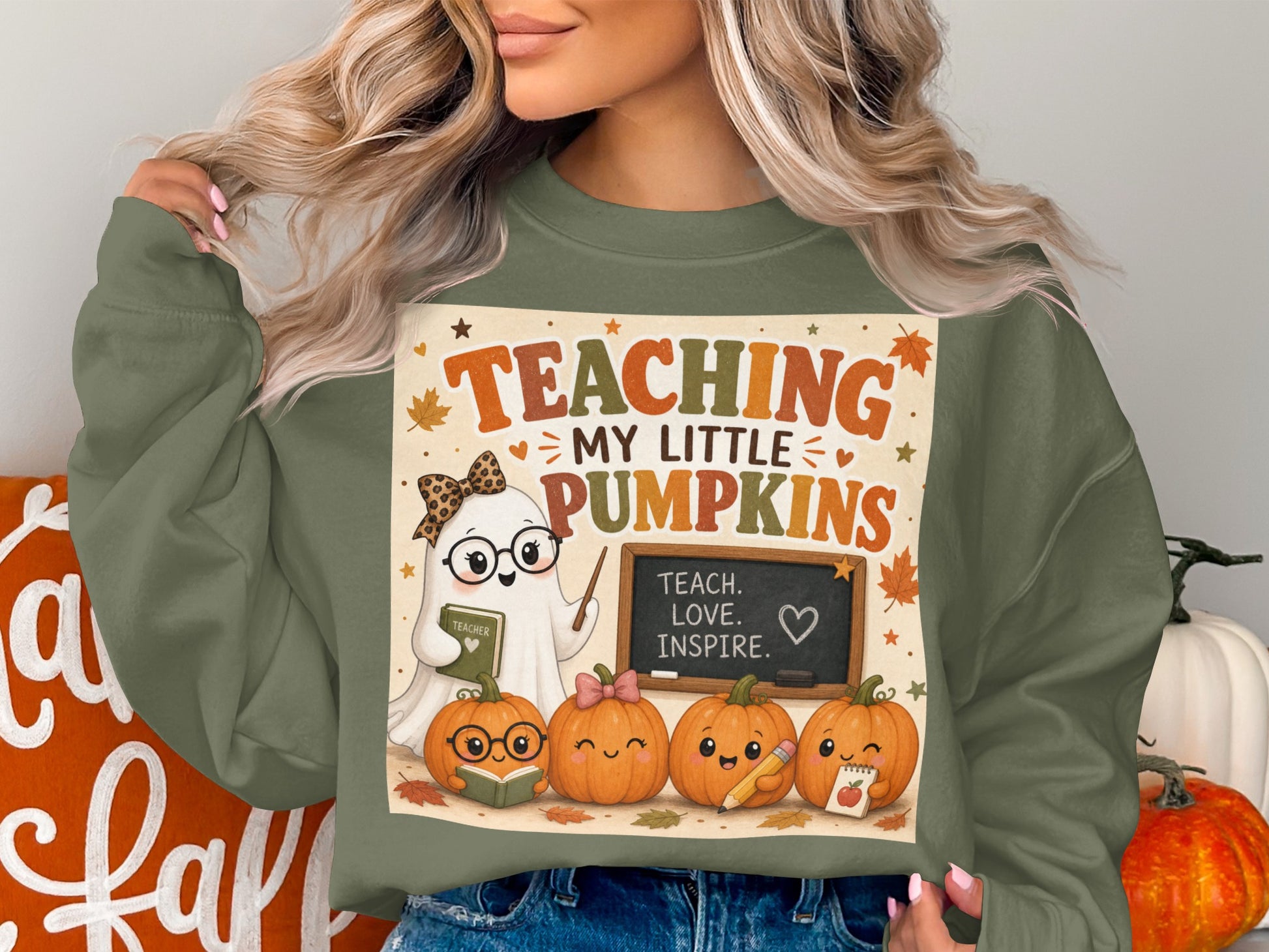 Ghost teacher with pumpkins wearing glasses reading and writing on a chalkboard.
