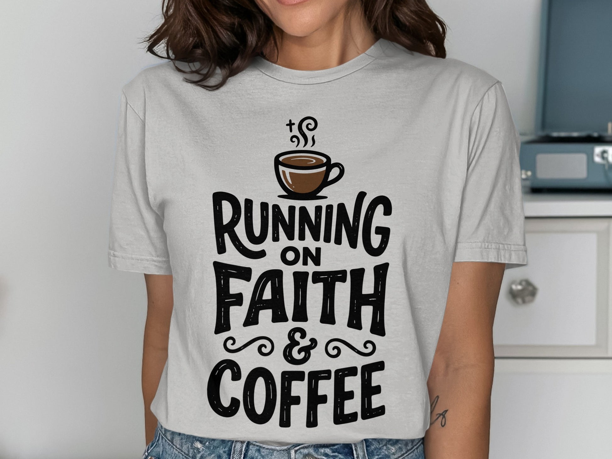 Light grey t-shirt with "Running on Faith & Coffee" text and coffee cup graphic.
