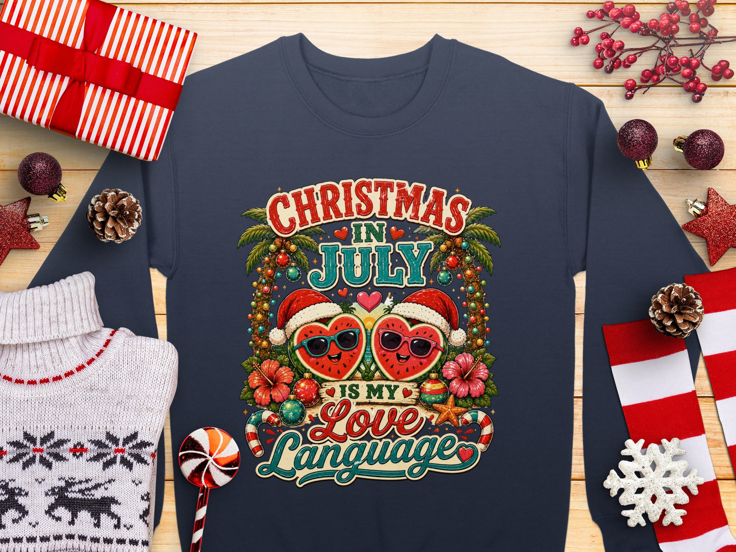 Navy sweatshirt with "Christmas in July is my love language" text and watermelon hearts.