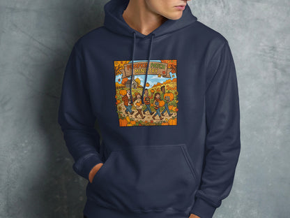 Navy hoodie with "Pumpkin Patch Ministry" graphic of people in a field.