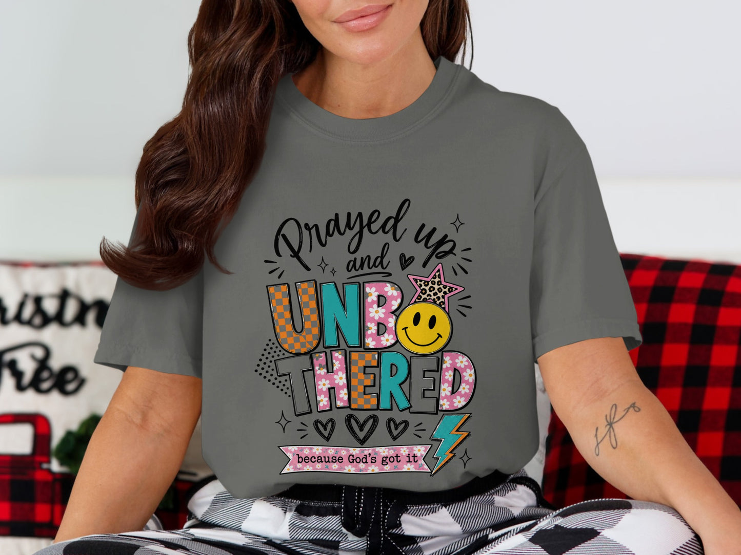 Gray t-shirt with "Prayed up and UNBOTHERED because God's got it" graphic.