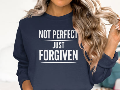 Navy sweatshirt with "Not perfect just forgiven" white text.