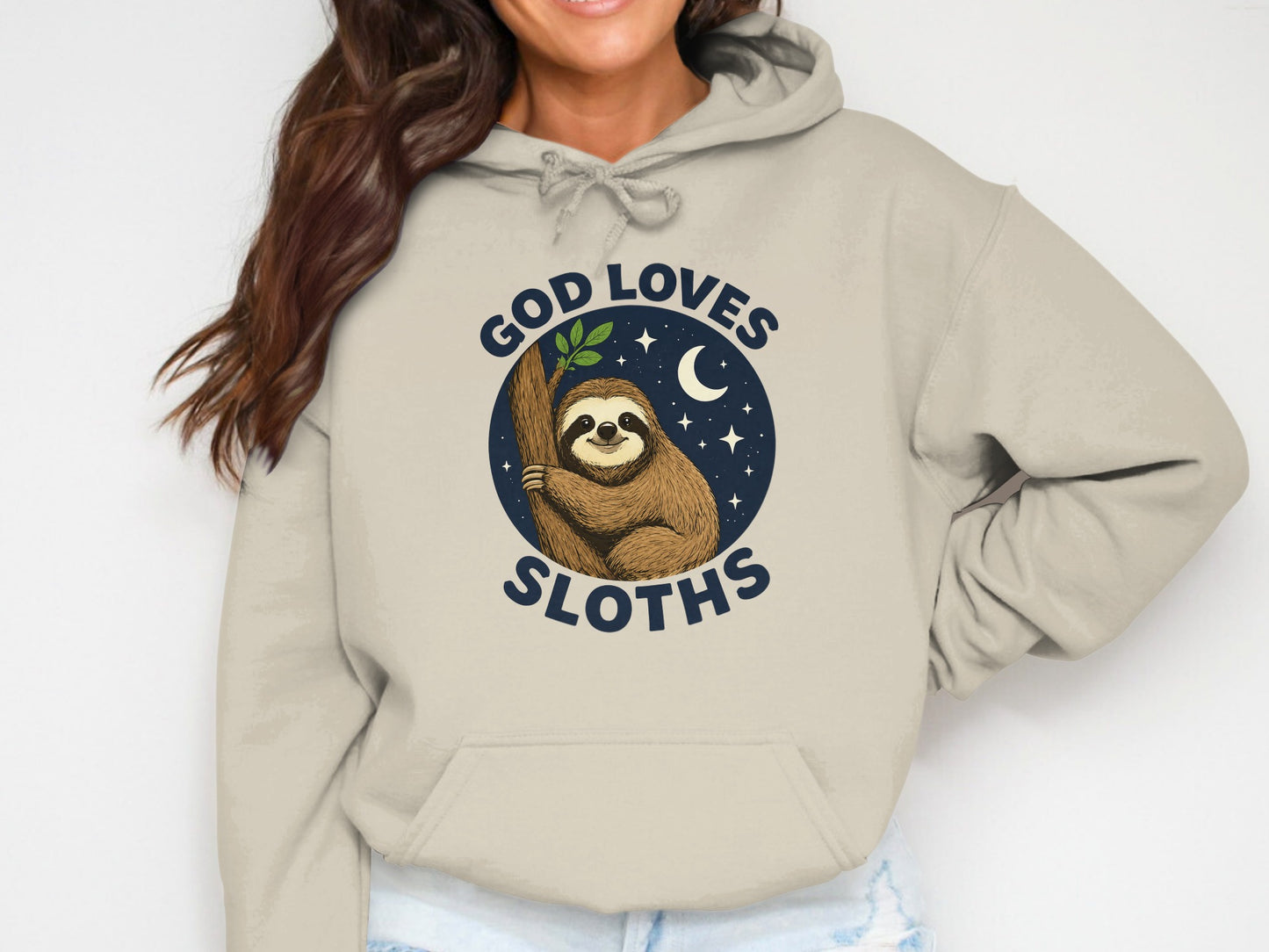 Sloth hanging on branch with "God Loves Sloths" text and starry night background.