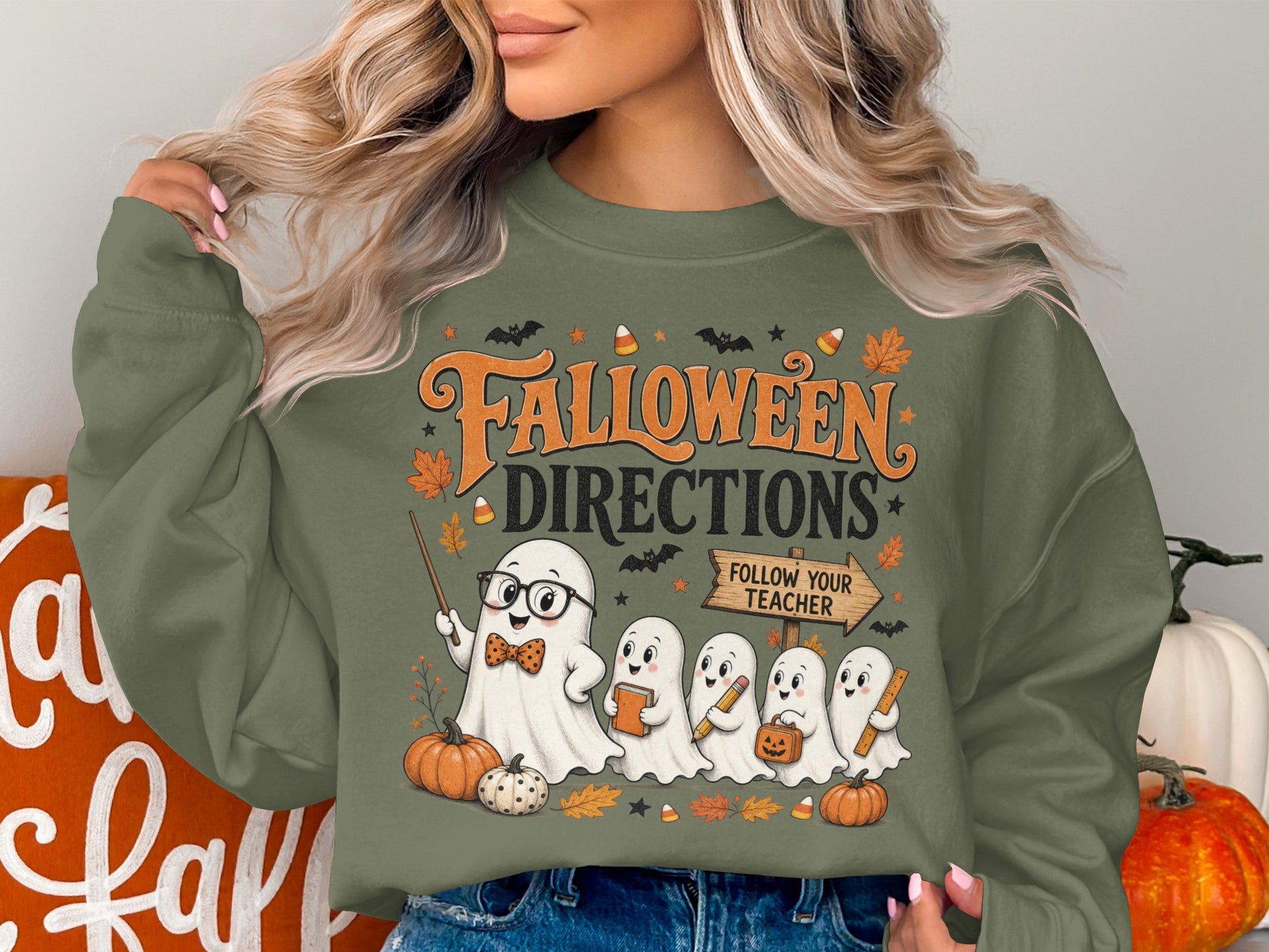 Halloween Directions "Follow Your Teacher" graphic with ghosts and pumpkins.