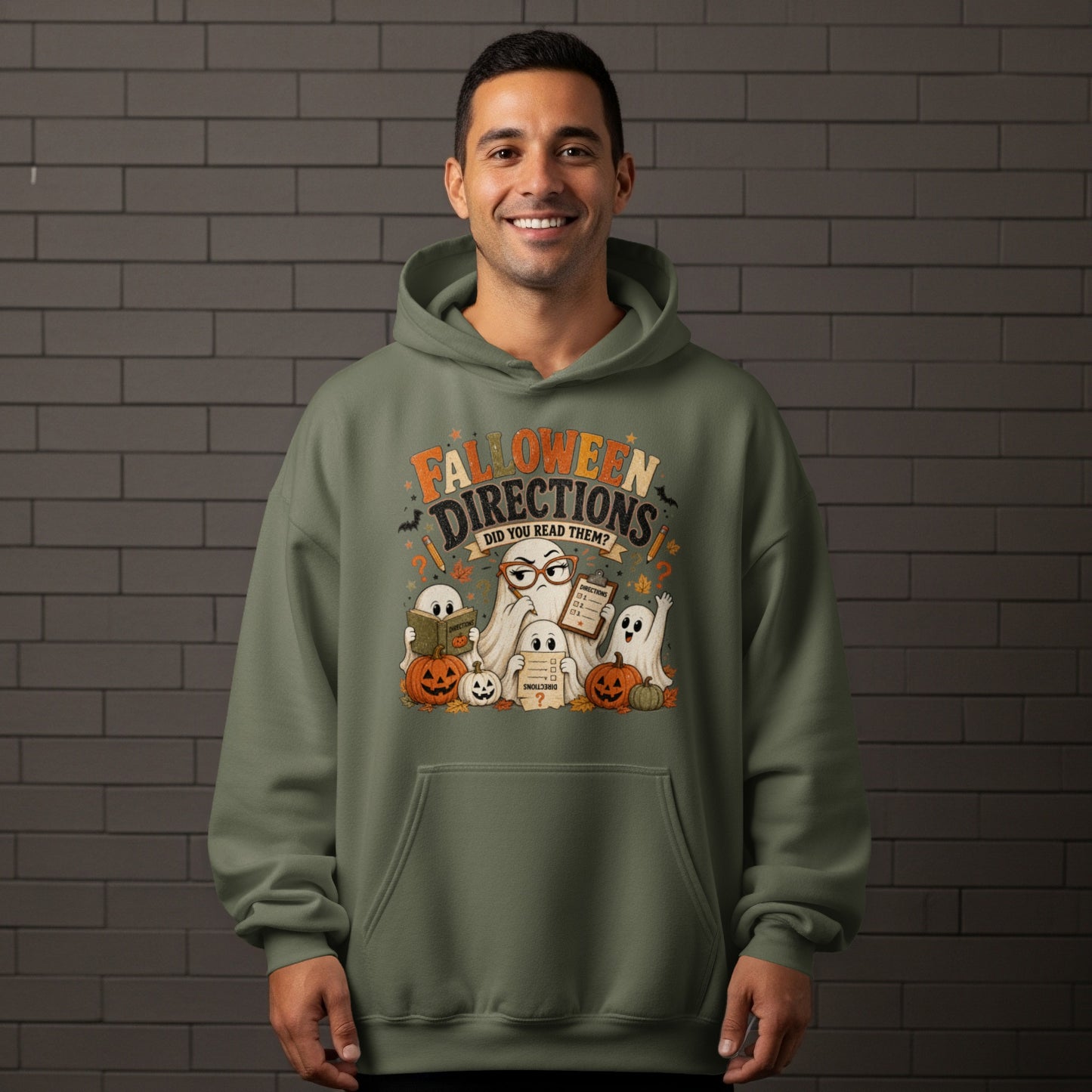 Halloween Directions design with ghosts, pumpkins, and text, on a green hoodie.