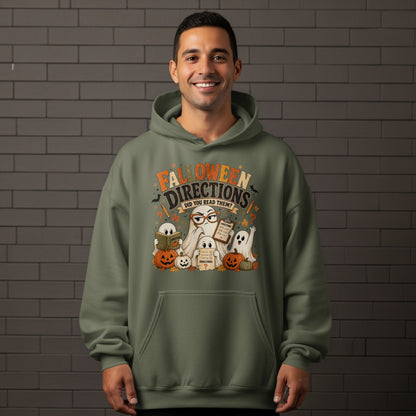 Halloween Directions design with ghosts, pumpkins, and text, on a green hoodie.