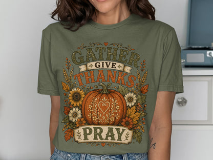 Green t-shirt with Thanksgiving design featuring pumpkin, sunflowers, and text.