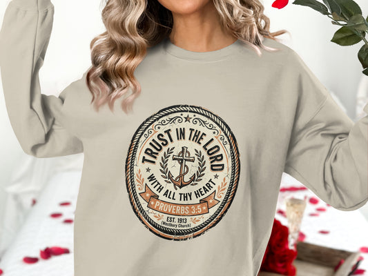 Cream sweatshirt with "Trust in the Lord Proverbs 3:5" circular graphic.