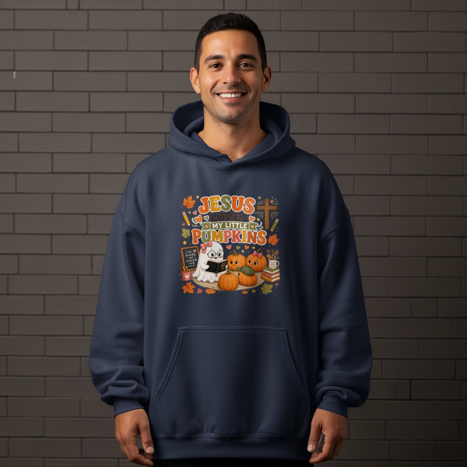 Navy hoodie with a graphic reading "Jesus Loves My Little Pumpkins" and Halloween imagery.