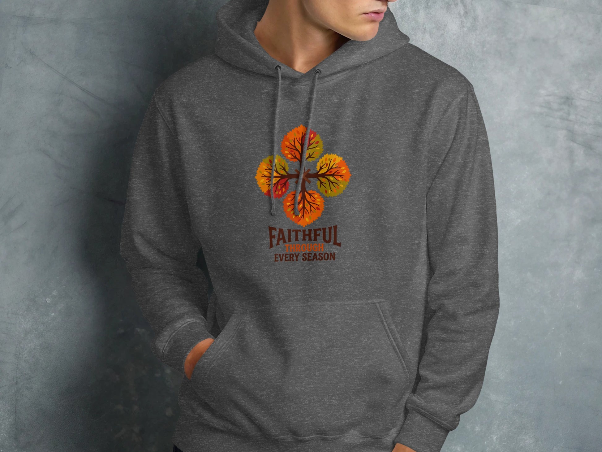 Dark grey hoodie with fall leaves and "Faithful Every Season" text.