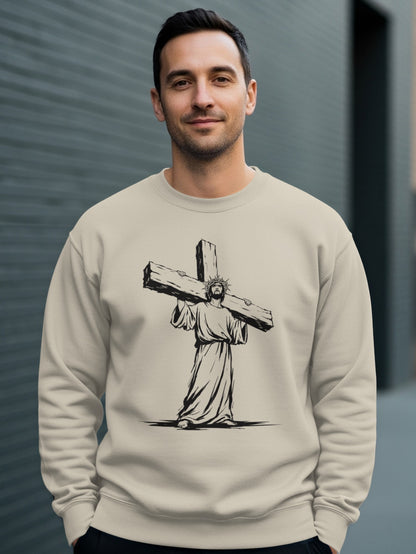 Man wearing crewneck sweatshirt with Jesus carrying cross graphic.