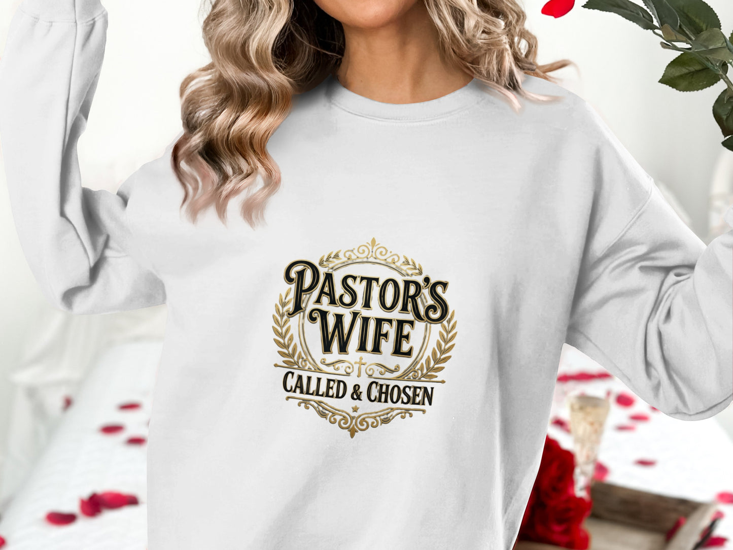 Crewneck sweatshirt with "Pastor's Wife Called & Chosen" text and ornate emblem.