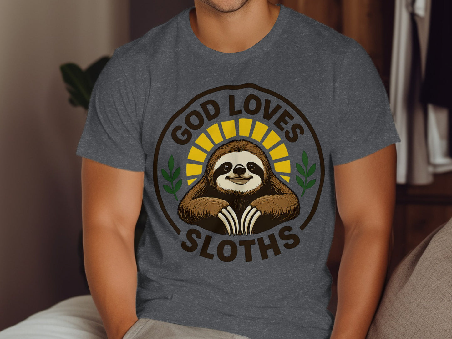 T-shirt with a smiling sloth and text "God Loves Sloths".