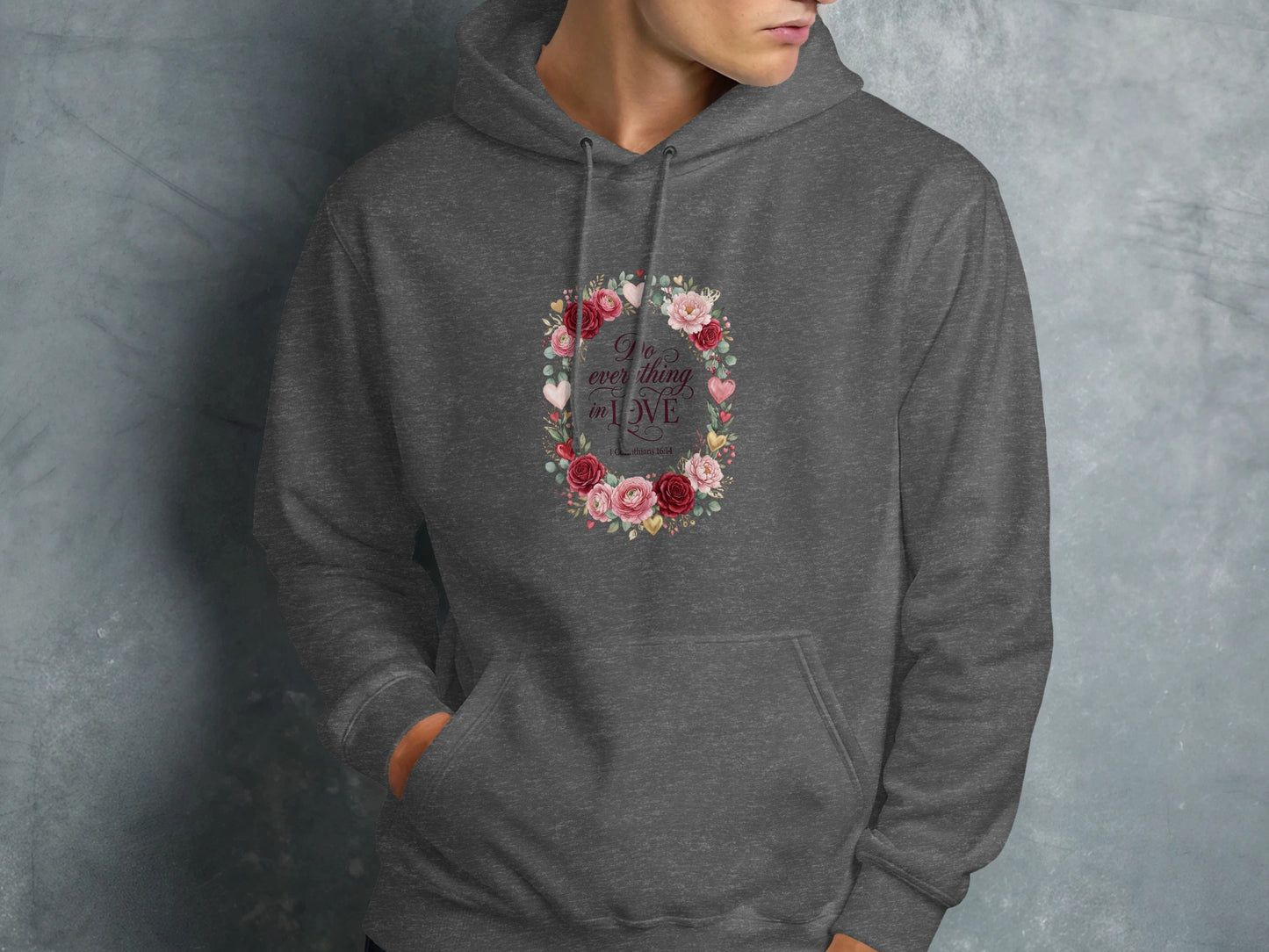 Dark gray hoodie with a floral wreath and "Do everything in love" text.